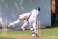 Cricket Batsman Plays Ball Bowler Action Close-Up Action Royalty Free Stock Photo