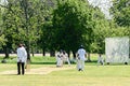 Cricket Batting Bowler Action Cricket game in London Royalty Free Stock Photo