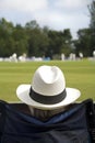 Cricket fan in sun hat Royalty Free Stock Photo