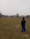 CRICKET PLAYERS WITH COACH IN ASSAM, INDIA