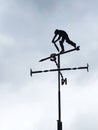 Cricket weather vane with old Father Time batting