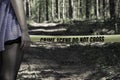 Crime Scene Do Not Cross. Woman in the woods Royalty Free Stock Photo