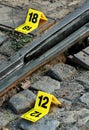 Crime Scene Evidence Markers Near to Rails Royalty Free Stock Photo