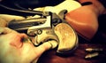 Crime scene: gun, bullets and high heels Royalty Free Stock Photo