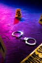 Crime scene handcuffs on the floor at night Royalty Free Stock Photo