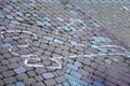 Crime scene with human body outline by chalk,drawing on the pavement.