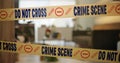 Crime scene, tape and evidence in house for case, inspection and investigation in living room. Apartment, home and Royalty Free Stock Photo