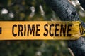 Crime scene yellow police tape closeup Royalty Free Stock Photo