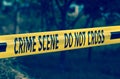 Crime scene yellow police tape closeup Royalty Free Stock Photo