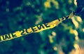 Crime scene yellow police tape closeup