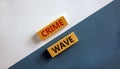 Crime wave symbol. Words `crime wave` on wooden blocks. Business and crime wave concept. Beautiful white and blue background. Co Royalty Free Stock Photo