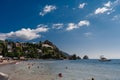 Crimea, Gurzuf - September 02.2021: Beach with tourists on the coast. Royalty Free Stock Photo