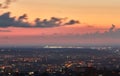 Crimea. Simferopol from a bird`s-eye view in the rays of the setting sun. The city is in the backlight.