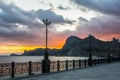 Crimean Black Sea embankment at sunset