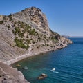 Crimean peninsula. People walk along the tourist route Golitsyn Trail. Botanical reserve New World