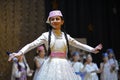 Crimean tartar children in native dresses performing native songs on stage