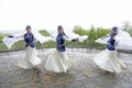 Crimean tartar girls dancers in a native costumes performing national dance. Celebrating of Hidirellez
