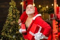 Criminal christmas. Funny Santas with bags - burglar or thief concept. Dangerous burglar dressed in Santa costume.