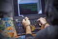 Criminal hacker hands locked in handcuffs. Closeup view