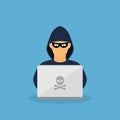 Criminal hacker with laptop.