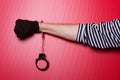 Criminal hand locked in handcuffs Royalty Free Stock Photo