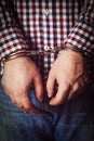 Criminal hands locked in handcuffs Royalty Free Stock Photo