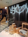 criminal looter rob vandalize retail shop , steal merchandise. graffiti activism paint and break all