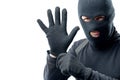The criminal puts on a glove Royalty Free Stock Photo