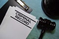 Criminal Record text on Document and gavel isolated on office desk. Royalty Free Stock Photo