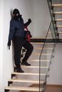 Criminal on staircase