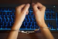 Criminal woman hacked in handcuffs. Closeup viewer hands lock