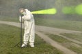 Measuring of bullet trajectory with ballistics trajectory laser and smoke on crime scene