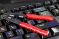 Crimper, crimp tool on the keyboard, 3D rendering