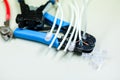 Crimper and wire cutter isolated on a white background. Twisting Cable Tool Twisted Pair Ethernet UTP Cat 5, Crimping RJ45 LAN