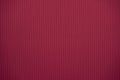 Crimson colored corrugated cardboard texture useful as a background Royalty Free Stock Photo