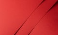 Crimson paper texture with deep ruby tones and a crosshatch pattern of fine, detailed lines. The