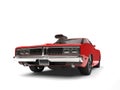 Crimson red American vintage muscle car - low angle front view Royalty Free Stock Photo