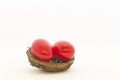 Crimson red nest eggs Royalty Free Stock Photo