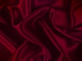 Crimson red silk texture. Modern abstract background with irregular folds pattern. Royalty Free Stock Photo