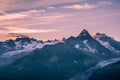 Crimson Sunrise over Mont-Blanc Snowy Peaks and Glaciers with Clouds Royalty Free Stock Photo