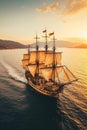 Crimson Tide. Small sailing ship in the open sea at sunset. Royalty Free Stock Photo
