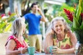 Cringing Lady Near Man on Phone Royalty Free Stock Photo