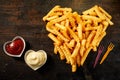 Crinkle cut crispy deep fried Pommes Frites Royalty Free Stock Photo