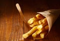 Crinkle cut golden french fries Royalty Free Stock Photo