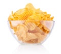 Crinkle cut potato chips in bowl isolated on a white background Royalty Free Stock Photo