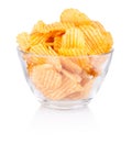 Crinkle cut potato chips in bowl isolated on white background Royalty Free Stock Photo