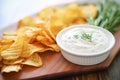 crinklecut potato chips with ranch dip, closeup Royalty Free Stock Photo
