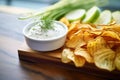 crinklecut potato chips with ranch dip, closeup Royalty Free Stock Photo