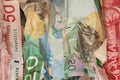 Crinkled Canadian dollar bills closeup