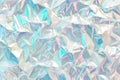 Crinkled foil texture sparkling in holographic pastel light. AI generated